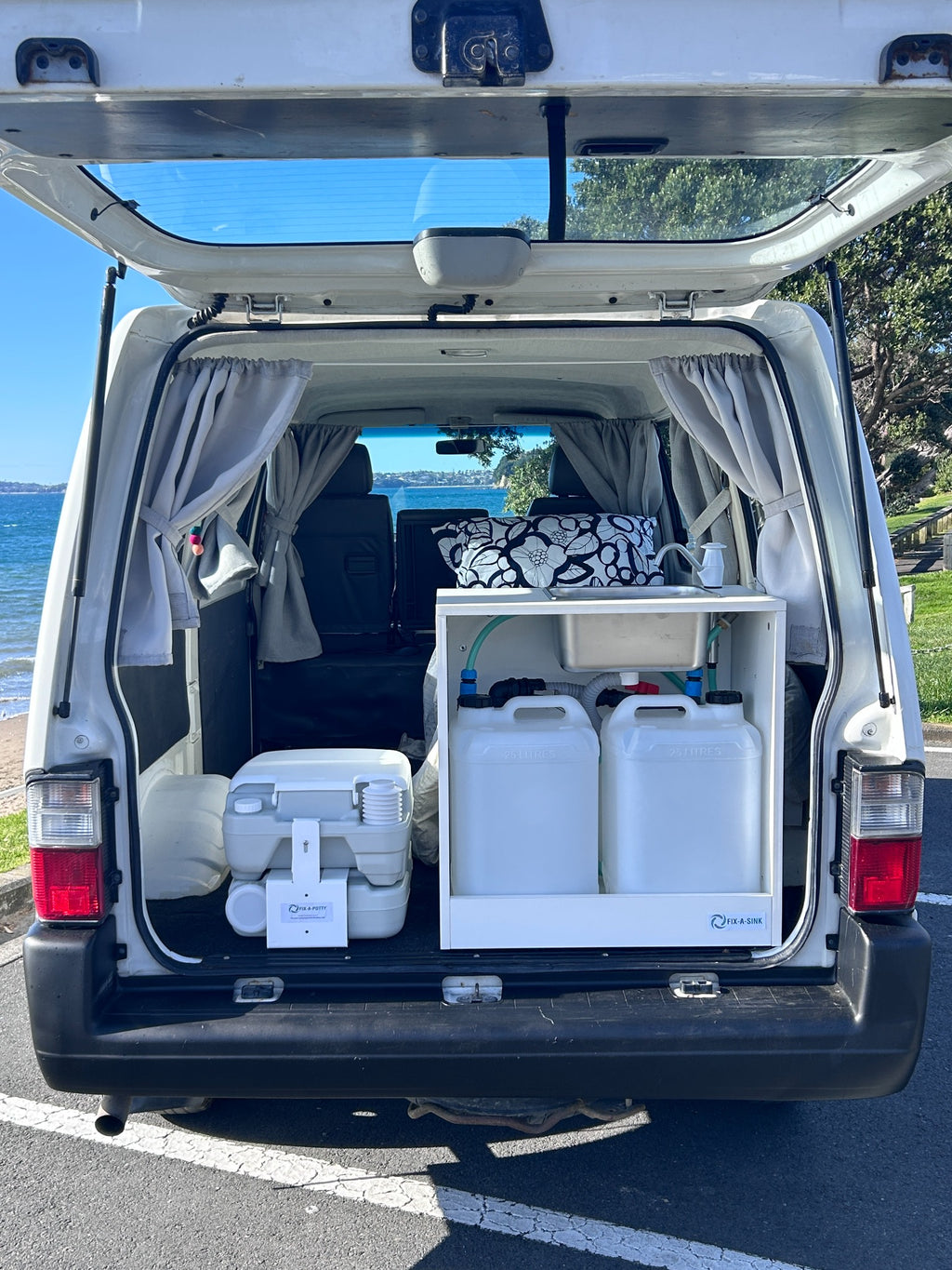 Fix-a-Sink installed in campervan with two 25 litre water tanks and plumbing